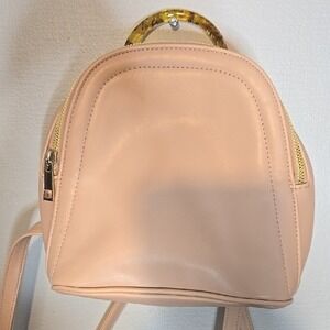a new day mini backpack tan with gold handle Pocket  ili York Take every day further with Daily Plus  a 21L everyday backpack with high organisation a new day | Bags